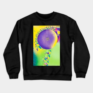 Colorful close up of oil drops in water Crewneck Sweatshirt